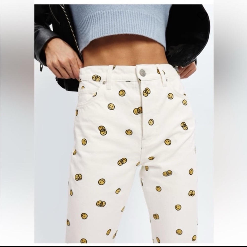 Reformation Cream Jeans with Yellow Smiley Print